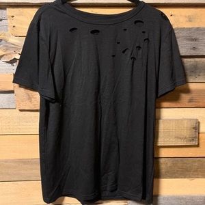 Brand new Boutique top. Super cute black key holes! Size medium